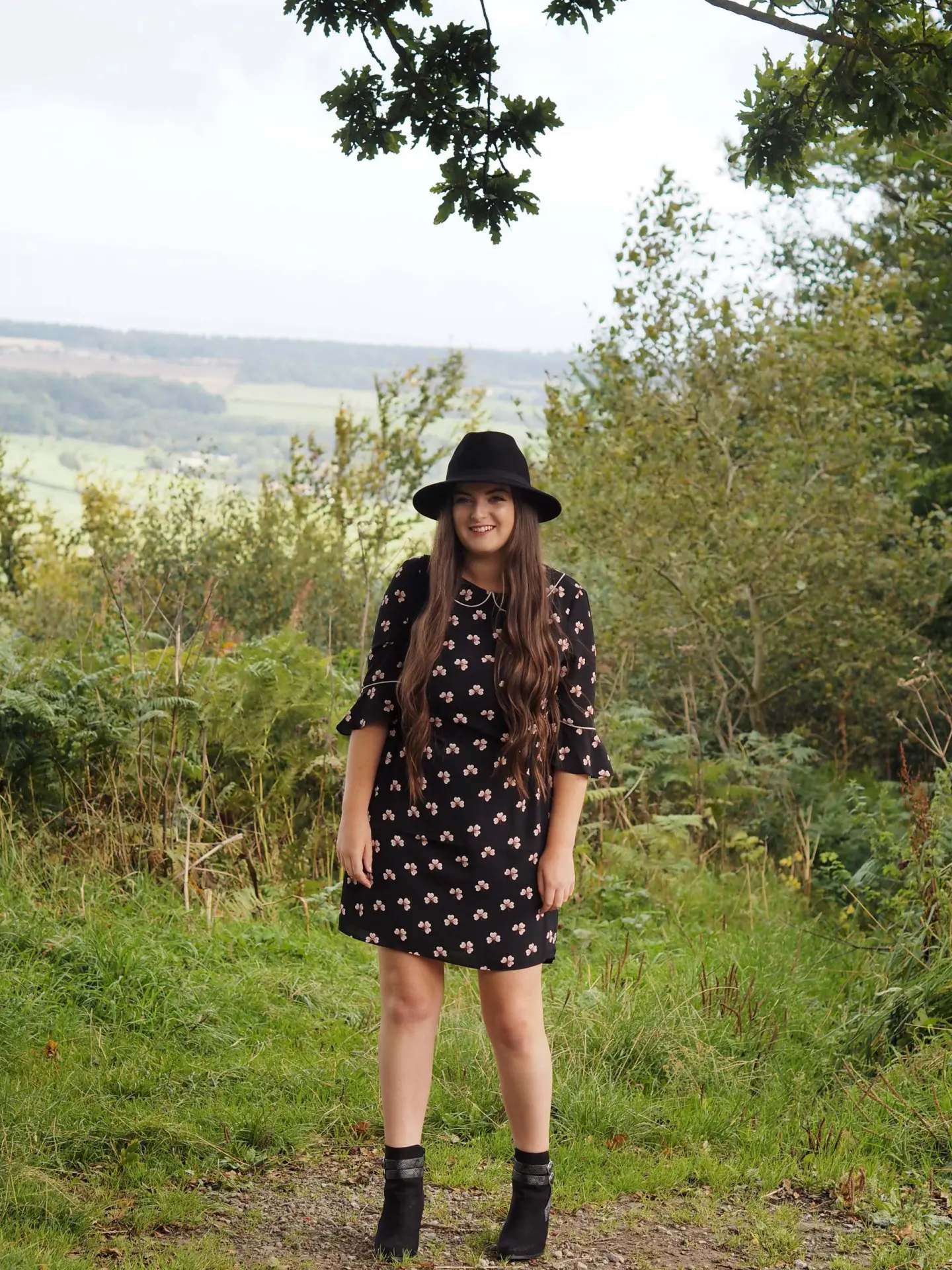 Peter Pan Collar & a Fringed Backpack